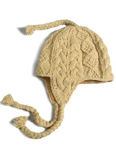 a knitted hat is shown on a white background