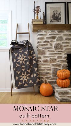 the mosaic star quilt pattern is displayed in front of a stone fireplace with pumpkins