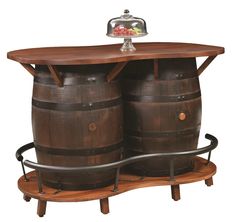 two wooden barrels sitting next to each other with a tapper on top of them