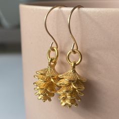 These cute little earrings are made to match our tiny charm pendants & bracelets.  Charm: 1.1 cm  Material: bronze with yellow gold plated. Pinecone Earrings, Anatomical Heart Pendant, Pinecone Necklace, Little Earrings, Bracelets Charm, Tiny Charm, Leaf Necklace, Rose Gold Necklace, Pendant Bracelet