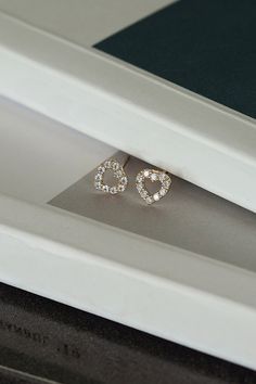 Close up photo of Gelin Diamond Heart Earrings. Small Diamond Earrings, Diamond Heart Earrings, Gold Pendant Jewelry, Gold Aesthetic, Celebrate Love, Heart Stud Earrings, Romantic Gifts, Heart Studs, Heart Earrings Studs