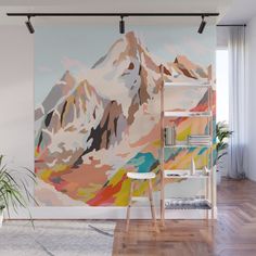 a room with a large painting on the wall