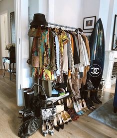 there are many shoes and hats on the rack