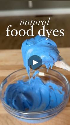 blue food dye in a glass bowl on a wooden table with the title natural food dyes