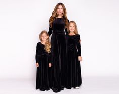 "Mommy and me black long velvet dresses, Flower girl dress, Mother and daughter dresses, Mother and daughter matching dress, Christmas photoshoot dress for mother and daughter, dresses for girls, dresses for kids You can find the pictures of ALL OTHER DRESSES & COLORS in our catalog on ETSY here: https://www.etsy.com/shop/ENMEstyle?ref=simple-shop-header-name&listing_id=1113727397&section_id=36136380 Dresses made from a beautiful velvet and features a bow belt. High quality stretch velvet fabric Mother And Daughter Dresses, Dresses Photoshoot, Dress For Mother, Long Velvet Dress, Pleated Skirt Dress, Mother Daughter Dress, Mommy And Me Dresses, Velvet Dresses, Dresses For Girls