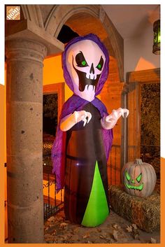 a large inflatable halloween decoration with a cat