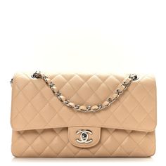 This is an authentic CHANEL Caviar Quilted Medium Double Flap in Beige. This stylish shoulder bag is crafted of luxurious caviar leather in light beige. The bag features polished silver chain link leather threaded shoulder straps and Chanel CC interlocking turn lock for the front flap. This opens to an inner flap and a matching leather interior with patch pockets. Classic Beige Double Flap Bags, Luxury Beige Double Flap Shoulder Bag, Elegant Beige Double Flap Bag, Classic Beige Shoulder Bag With Double Flap, Classic Beige Double Flap Shoulder Bag, Beige Formal Bags With Double Flap, Beige Double Flap Bag For Formal Occasions, Formal Beige Bags With Double Flap, Formal Beige Double Flap Bags