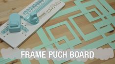 the frame punch board is sitting on top of a wooden table