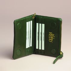 We present the Irene & Me Leather wallet in a unique moss green color combined with antique brass hardware. The look is perfectly complemented by the gold Modern Redd logo on the outside and the inside of this leather billfold. The wallet is crafted from hand-selected full-grain lambskin nappa leather, providing a soft tactile feel and longevity. We designed it to be versatile and handy, and it folds in half; we added a detachable wristlet for convenience. It features slip pockets for credit car Modern Green Wallet For Everyday Use, Versatile Green Wallet, Functional Green Rectangular Wallet, Modern Green Leather Wallet, Green Leather Wallets With Zipper Closure, Moss Green Color, Leather Billfold, Antique Brass Hardware, Moss Green