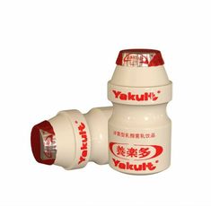 a white and red bottle with the word yakuki on it's side