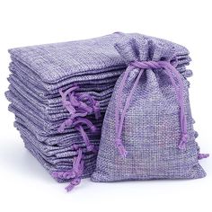 a stack of purple cloths sitting on top of each other