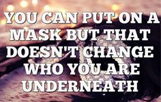 a pair of shoes sitting on top of a beach next to the ocean with words that read, you can put on a mask but that doesn't change who you are underneath