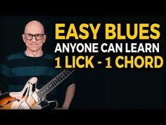 an image of a man playing guitar with the words easy blues anyone can learn 1 lick -