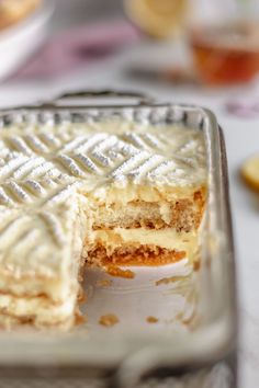 there is a cake that has been cut in half on the plate and ready to be eaten