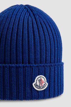 A mid-weight knit, this beanie provides warmth during daily walks and outdoor playtime. The woolen accessory is embellished with a logo patch. Casual Wool Hat With Embroidered Logo, Blue Wool Knitted Beanie, Blue Wool Beanie, Outdoor Blue Knitted Beanie, Moncler Beanie, Shoes For Children, Daily Walks, Blue Beanie, Daily Walk