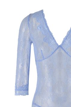 Details Blue lace mini dress Lace with micro sequin detailing fabrication Mini length and fitted silhouette Deep V neckline with lace trim Featuring 3/4 length sleeves with lace trim along opening Invisible zipper at wearer's left side seam for easy entry Style is partially lined - Please note this style is sheer Undergarment included with dress - Blue cheeky style underwear for comfort and security We recommend wearing with your favourite intimates set Please note: Lace is a unique design and c Blue Long Sleeve Mini Dress With Lace Trim, Long Sleeve Blue Mini Dress With Lace Trim, Fitted Light Blue Lace Tops, Blue Fitted Mini Dress With 3/4 Sleeve, Entry Styling, Blue Lace Mini Dress, Mini Dress Lace, 80 Dress, Festival Dress