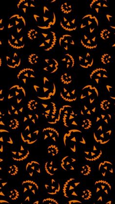 an orange and black background with pumpkins in the shape of jack - o'- lanterns