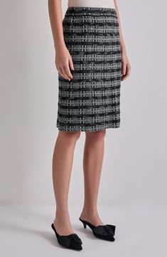 Textured tweed charms this sophisticated pencil skirt cut in a knee-length silhouette with an easy pull-on design. 23" length (size Extra Small) Pull-on style Unlined 40% viscose, 25% polyester, 20% acrylic, 15% rayon Hand wash, dry flat Imported Office Wardrobe, Knee Length Skirt Pencil, Knit Pencil Skirt, Pencil Skirt Black, The Missing, Knit Skirt, New Black, Pencil Skirt, Knee Length