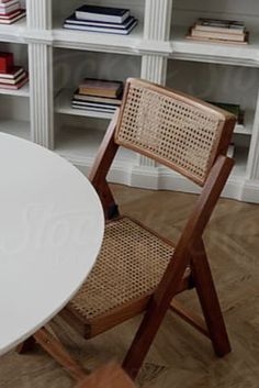 Minimal, small breakfast room with table, sofa, wooden chairs, and a book shelf Small Breakfast Room, Small Breakfast, Sofa Wooden, Wooden Chairs, Table Sofa