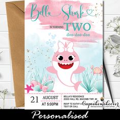 a baby shark birthday party with pink and blue watercolors on the background, is shown