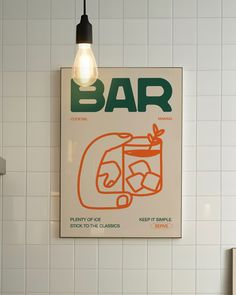 a bar sign hanging on the wall next to a sink and toilet paper dispenser