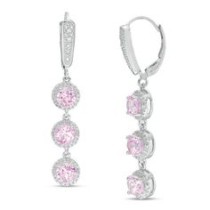 Feminine and elegant, these sparkling fashion drop earrings ensure an exquisite entrance. Crafted in sterling silver, each luxe and lovely design features a linear trio of 5.0mm lab-created bright pink sapphire dangles, each bordered by petite diamond accents and beaded detailing. Diamond accents and beading decorate the tapered post above to complete this glamorous style. Buffed to a brilliant luster, this fabulous three-stone earrings secure with lever backs. Zales Zales, Pink Sapphire Jewelry, Pink Sapphire Earrings, Stone Drop Earrings, Solitaire Earrings, Sterling Silver Drop Earrings, Sparkly Earrings, Beaded Drop Earrings, Pink Jewelry