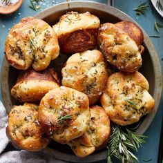 bread rolls with herbs and seasoning in a bowl