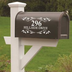 a mailbox with the words hillside drive painted on it's front and side