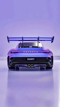 a purple sports car is shown in this image