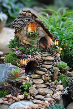 a small house made out of rocks and plants