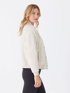 Stay warm and stylish all season long with the Lynette Sherpa Bomber Jacket. Its soft and cozy material provides ultimate comfort, while the classic fit and button front add a touch of sophistication. Soft Textured Outerwear For Fall, Cozy Long Sleeve Outerwear With Button Closure, Cozy Relaxed Fit Outerwear With Soft Texture, Cozy Outerwear With Soft Texture And Relaxed Fit, Fall Outerwear With Soft Texture For Everyday, Soft Texture Outerwear For Fall, Soft Texture Outerwear For Everyday Fall Use, Soft Textured Winter Outerwear For Loungewear, Cozy Solid Outerwear For Loungewear