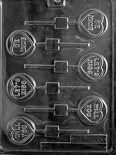 a plastic tray with several different types of keys on it, including one for each key