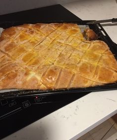 a large pastry sitting on top of an oven