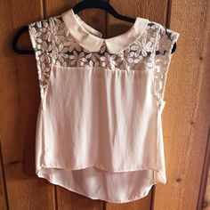 Cream With Embroidered Flowers. High/Low Style. One Button On Back. Super Cute Just Never Got Around To Wearing It And Now I’m Moving. Spring Tops With Lace Trim And Cute Collar, Chic Tops With Cute Collar For Spring, Cream Top, Cream Tops, Embroidered Flowers, On Back, And Now, High & Low, High Low