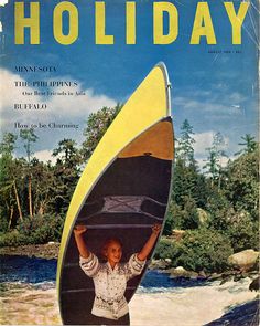 a magazine cover with a woman holding a surfboard