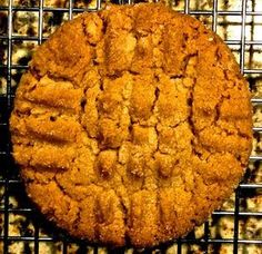 a cookie sitting on top of a cooling rack