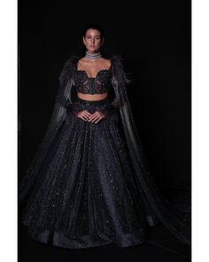 Draped in elegance, the Charcoal Blue Lehenga whispers tales of sophistication and grace. Fitted Party Wear Sets For Gala, Fitted Sets For Gala Party Wear, Luxury Fitted Lehenga For Party, Fitted Black Set For Gala, Fitted Black Sets For Gala, Black Fitted Sets For Gala, Luxury Black Sets For Reception, Navy Blue Lehenga, Indian Bridal Couture