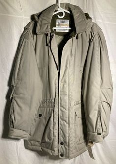 Vintage London Fog Mens Overcoat Cotton Polyester Jacket. Size: Large.  Color: Clay.  Snap on Hood(Removable).  Closure: Double Zipper with added Hook & Loop patch in middle + Snap Buttons ( one at top, 2 at bottom).  Back 34",  Sleeve 24", Waist: 25, Shoulder: 22", P to P: 27". Condition is New Old stock with tags. MSRP $115.00.  Shipped with USPS Mail/Fedex. Mens Overcoat, Hooded Jacket Men, Polyester Jacket, Vintage London, London Fog, Vest Jacket, Hooded Jacket, Mens Jackets, Rain Jacket