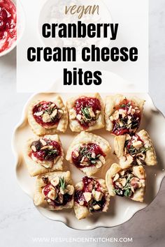 vegan cranberry cream cheese bites on a white plate with the title above it