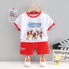 Toddler Boy Superman Pattern Shirt T-shirt & Shorts Wholesale Children's Clothing - PrettyKid White Character Print Summer Sets, White Character Print Sets For Summer, Red T-shirt For Summer Playwear, Red Cartoon Print Tops For Playwear, Red Summer Playwear T-shirt, White Cotton Sets With Character Print, Red Character Print T-shirt For Playtime, White Playwear Set With Character Print, White Character Print Playwear Sets