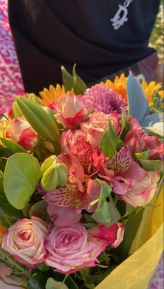 a bouquet of flowers sitting on top of a table