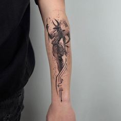 a person with a tattoo on their arm