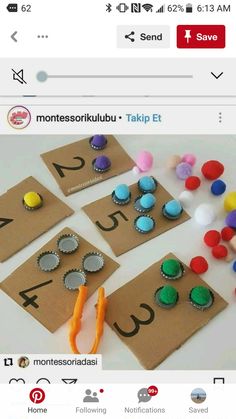 some kind of crafting activity with buttons and scissors on top of a piece of paper