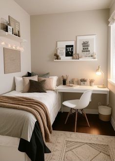 a bedroom with a bed, desk and pictures on the wall