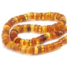 Amber Wheel Necklace/Strand – Beads of Paradise Baltic Region, Small Insects, Graduation Necklace, Nugget Necklace, Pure Form, Small Objects, Amber Earrings, Round Necklace, Cylinder Shape