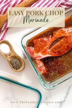 an easy pork chop marinade in a glass baking dish with spices and seasoning