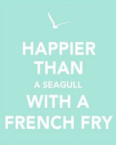 a poster with the words happier than a seagull with a french fry