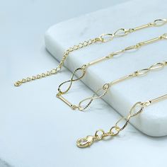 "18k Gold Filled 5mm Infinity Sign Necklace or Bracelet or Earrings Set -Necklace Size: Length: 16'' to 18'' with 2 inches extender | Thickness Infinity: 5mm -Bracelet Size: Length: 8'' to 10'' with 2 inches extender | Thickness Infinity: 5mm -Earrings Size: Height: 45mm | Thickness: 5mm When a person wears or carries an evil eye with them, it guards against misfortune happening in one's life. The evil eye brings good luck and protects you from any ill-will that could otherwise have a negative e Minimalist Gold Infinity Jewelry, Minimalist Infinity Gold Jewelry, Gold Delicate Chain Bracelet For Anniversary, Delicate Gold Chain Bracelet For Anniversary, Formal Multi-strand Gold Chain Jewelry, Classic Gold Infinity Jewelry, 14k Gold Infinity Jewelry, Yellow Gold Infinity Jewelry With Delicate Chain, Dainty Gold Infinity Bracelet