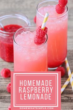 two glasses filled with raspberry lemonade on top of a wooden table