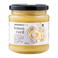 a jar of lemon curd on a white background